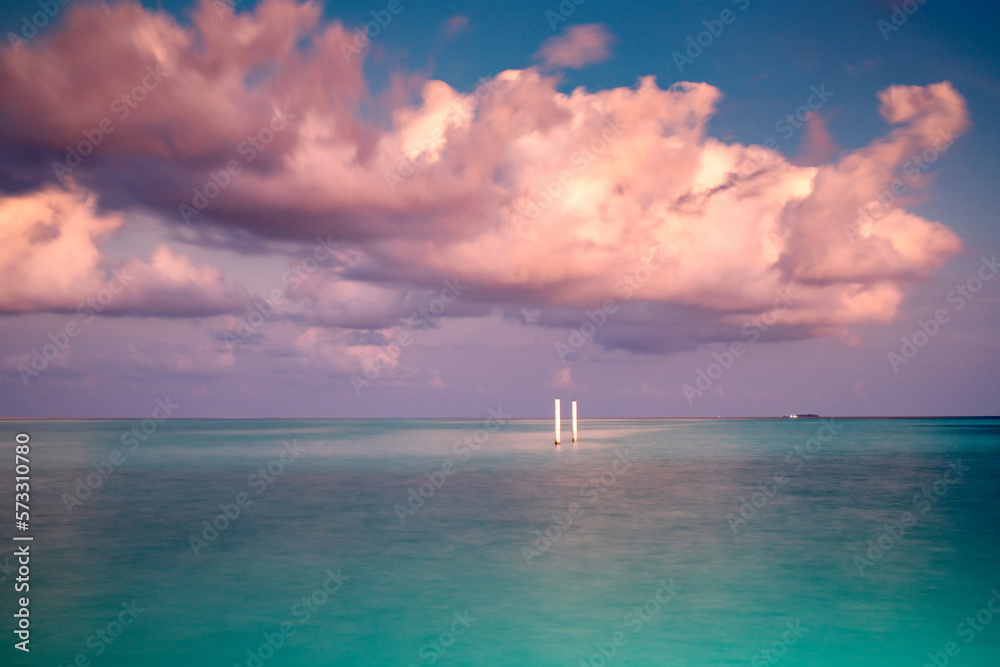 amazing landscape with turquoise sea and pink sunset cloud amazing landscape with turquoise sea and pink sunset cloud
