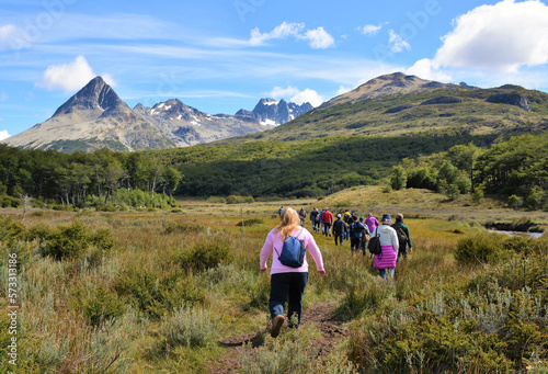 A group of tourists hike through the peat bogs of Tierra Del Fuego National Park at the southern tip of South America