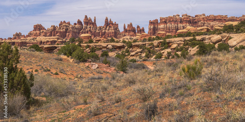 hiking the chesler park loop trail in the needles in canyonlands national park, usa photo