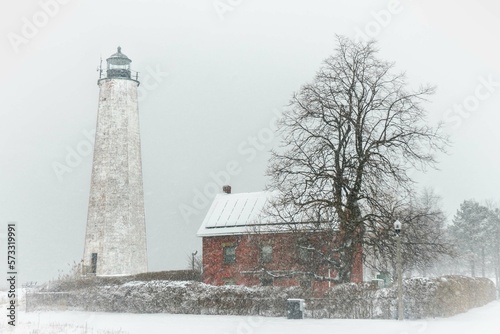 Five Mile Lighthouse in New Haven, CT, During a Snowstorm at Lighthouse Park