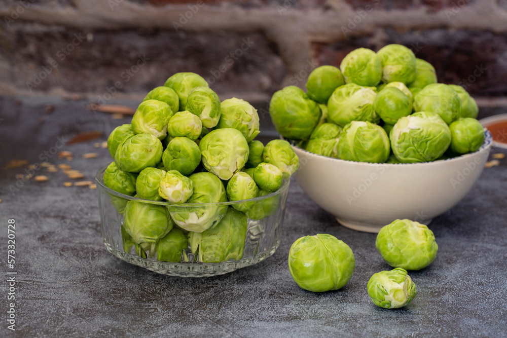 Macro shots of fresh Brussels sprouts. brussels sprouts background. Close-up of raw, fresh and whole brussels sprouts Macro shots of fresh Brussels sprouts. brussels sprouts background. Close-up of raw, fresh and whole brussels sprouts