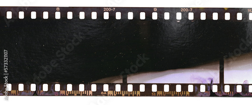 wrong underexposed 35mm film strip on isolated with smear marks, scratches and dust.