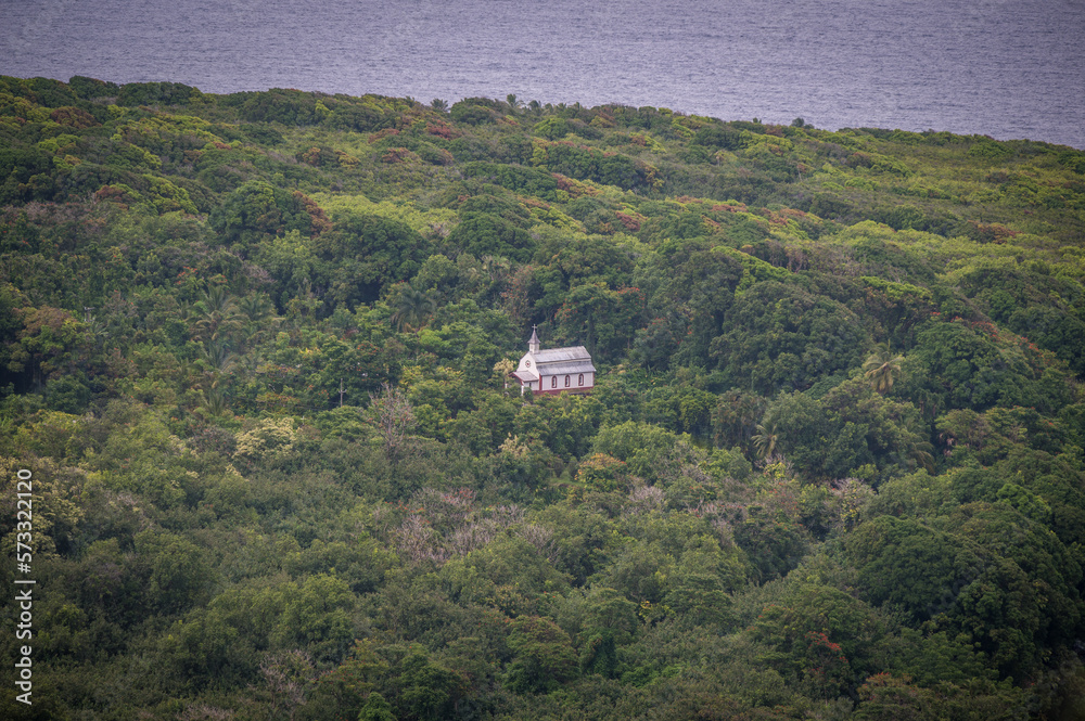 A lone church in the green Hawaiian jungle, on the Road to Hana