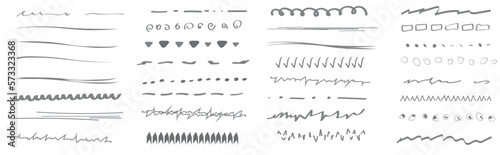 A set of wavy horizontal artistic brushes.Doodles, ink brushes. Set of vector grunge brushes. Collection of marker strokes.