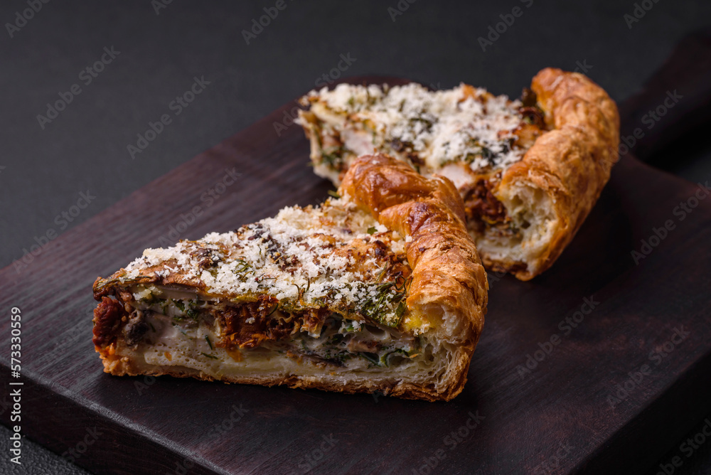 Delicious quiche with chicken, cheese, herbs, spices and herbs