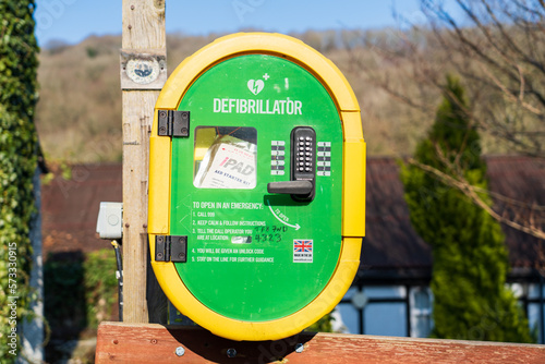 Ironbridge, Shropshire, UK – February 12 2022: A Defibrillator at the village hall in Jackfield near Ironbridge in Shropshire in the uK photo