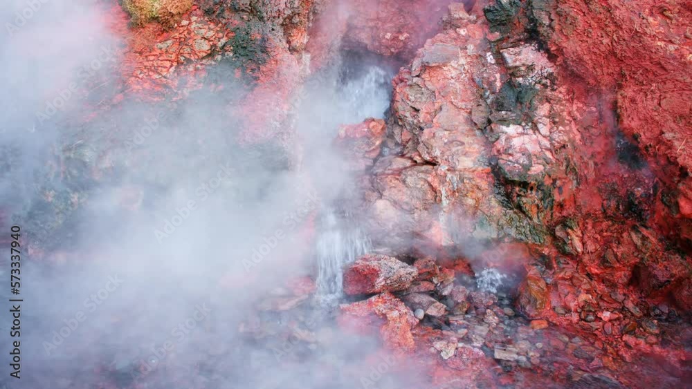 Geothermal area in Iceland, natural hot spring. Stunning boiling clear water in sulfur valley. Nature miracle beautiful landscape. Deildartunguhver thermal area. Shot in 8k resolution. Geothermal area in Iceland, natural hot spring. Stunning boiling clear water in sulfur valley. Nature miracle beautiful landscape. Deildartunguhver thermal area. Shot in 8k resolution.