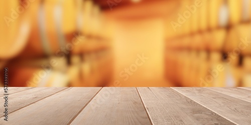 Empty wooden table top with out of focus wine cellar background with wooden wine barrels