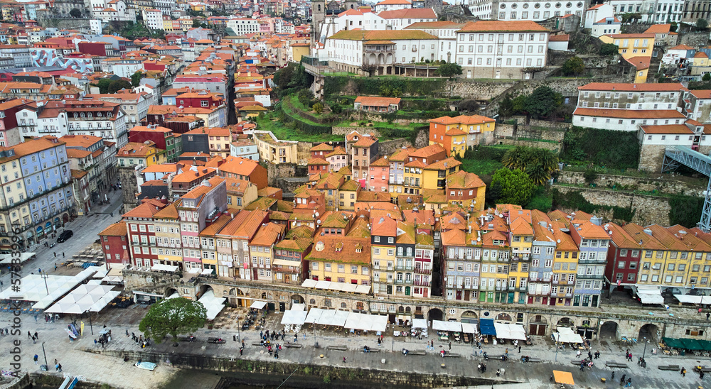 Porto, Portugal - 12.25.2022: Aerial view of the old city of Porto. Portugal old town ribeira aerial promenade view with colorful houses. High quality photo