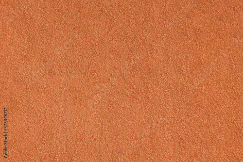 Orange plastered wall. Texture, background, free space for text. High resolution