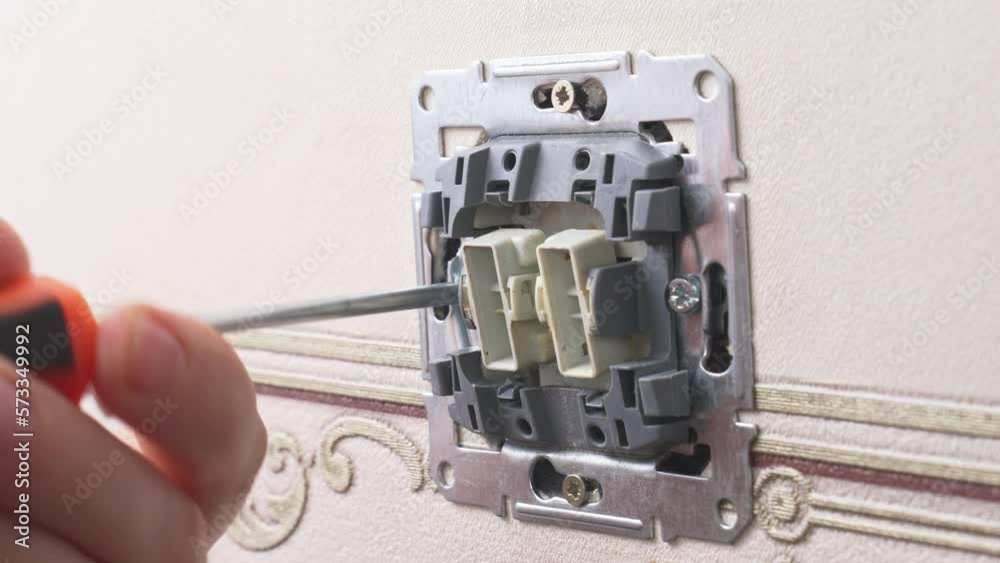 Installation of a switch. repair of electrical appliances and wiring. Installation of a switch. repair of electrical appliances and wiring.
