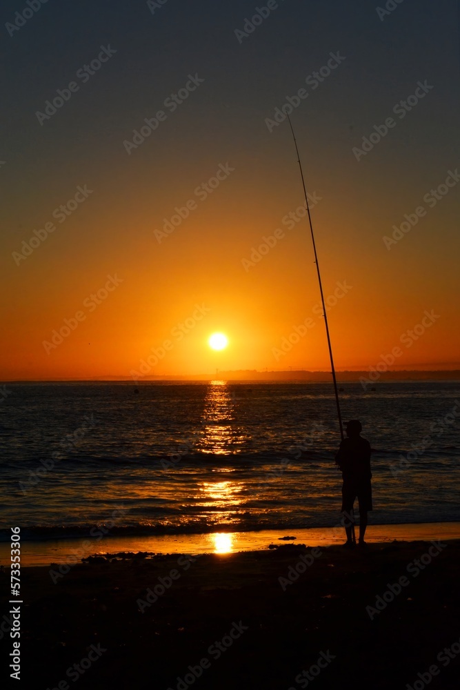 A fisherman was lost on the seashore as the sun set