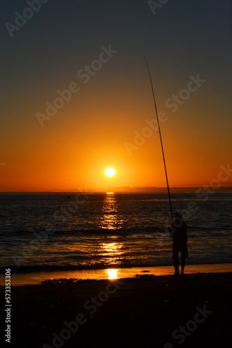 A fisherman was lost on the seashore as the sun set