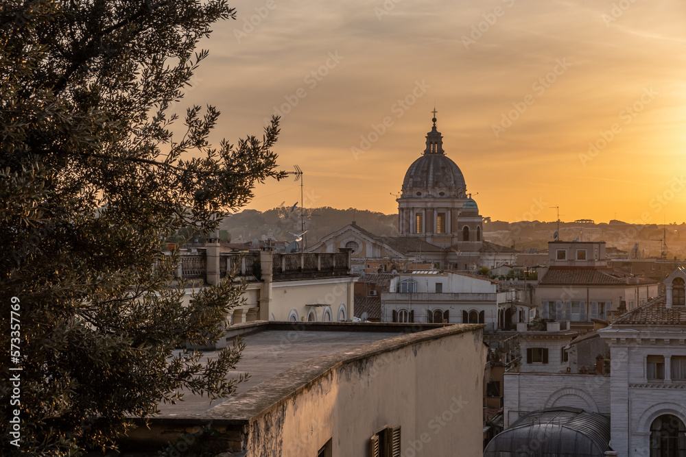 Enjoying the wonderful colors of sunset on the roofs of Rome