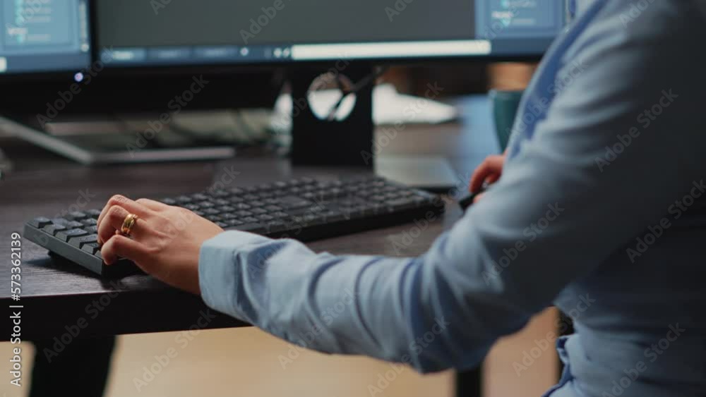 Female engineer working on computer to create 3d machine component, developing industrial engine product. Office employee usingcad software to manufacture mechanical prototype. Close up. Female engineer working on computer to create 3d machine component, developing industrial engine product. Office employee usingcad software to manufacture mechanical prototype. Close up.
