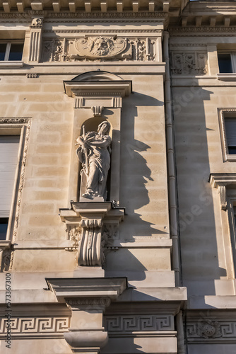 Architectural details of old buildings in Paris: The Criminal Court of Paris (Tribunal Correctionnel) located at the Palais de Justice at 14 Quai Goldsmiths. Paris. France. photo