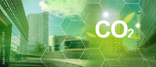 Problems and solutions of CO2 emission. Urban landscape blurry background, city making future clean.