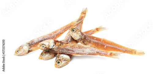 Delicious dried salted anchovies on white background