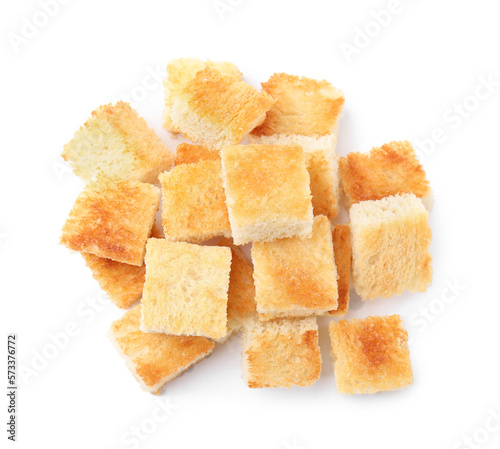 Delicious crispy croutons on white background, top view