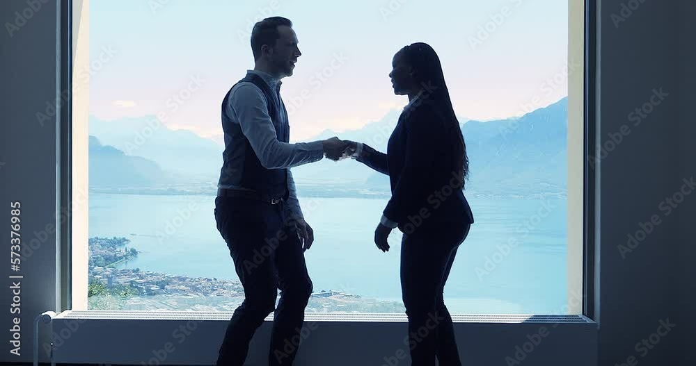 Two Young Business People Meeting Talking About Finance Corporate Sales Deal Agreement Inside Modern Building Two Young Business People Meeting Talking About Finance Corporate Sales Deal Agreement Inside Modern Building