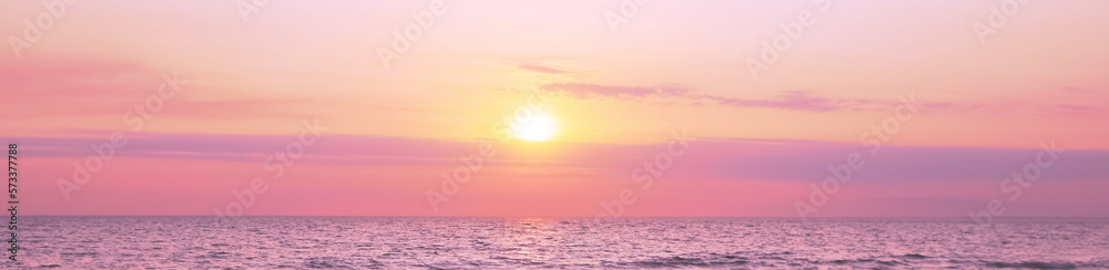 Beautiful panorama of sky over sea at sunset. Banner design