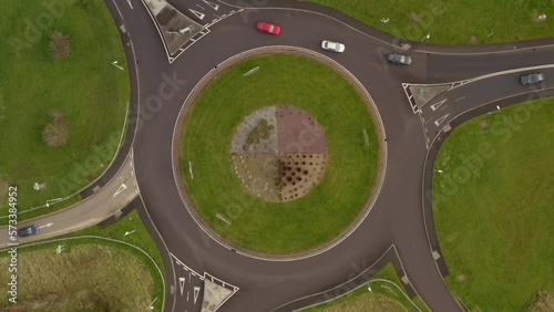 Top aerial spinning shot of an Irish roundabout. Gort, Galway, Ireland, photo