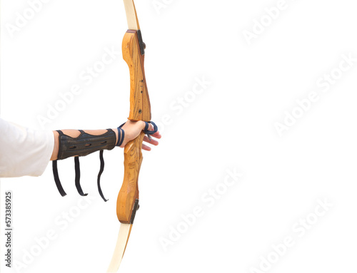Wooden tradition bow in archer hand with wrist guard