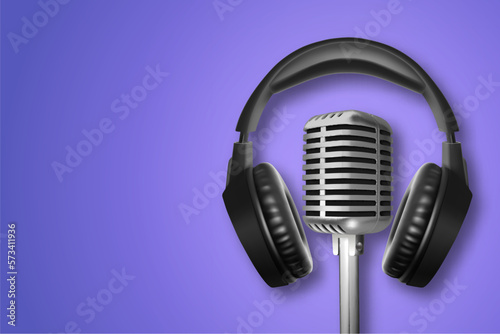 Wireless headphones with retro microphone on purple background. Music or karaoke concept. EPS10 vector
