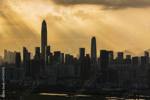 Silhouette of skyline of Shenzhen city  China under sunset. Viewed from Hong Kong border
