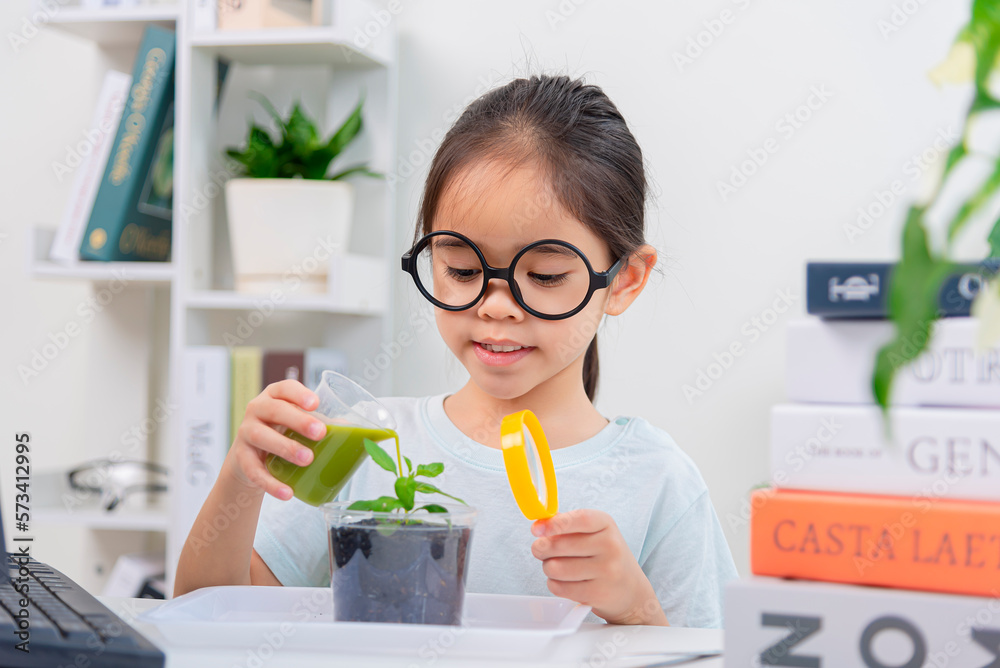 little Girl in biology class learning plants little Girl in biology class learning plants