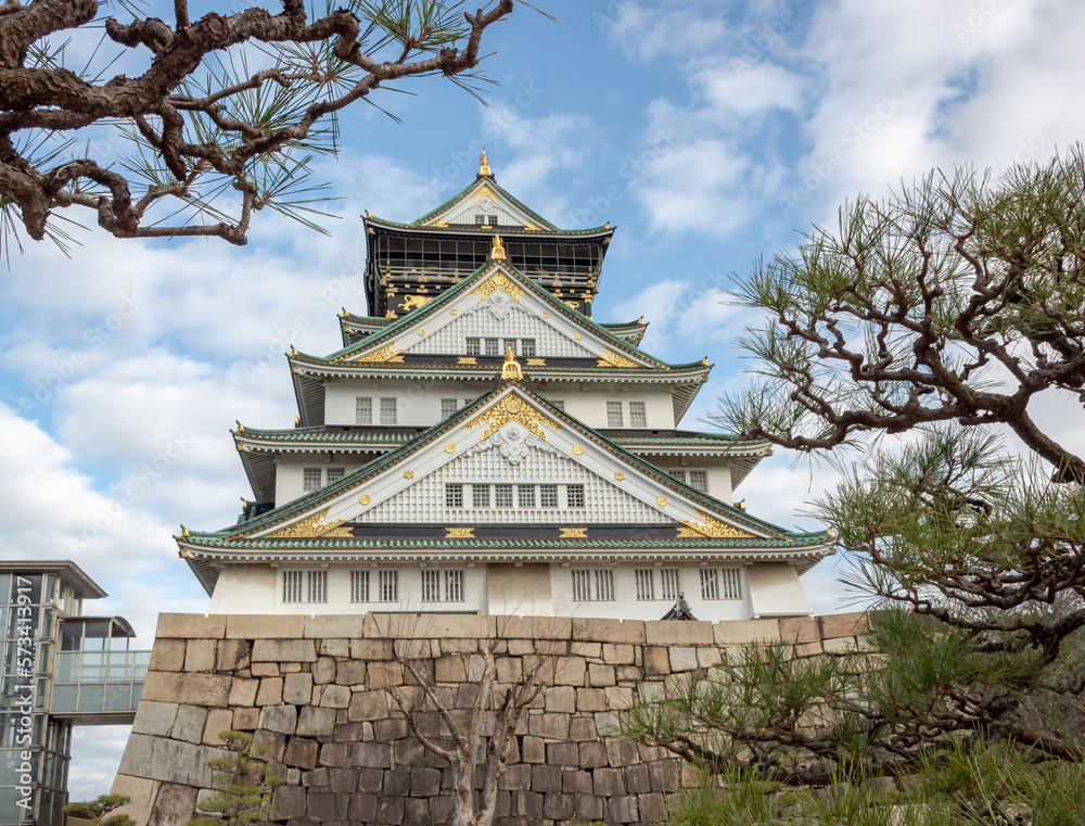 Green and white traditional Japanese architecture building of the Osaka Castle in Osaka Japan Green and white traditional Japanese architecture building of the Osaka Castle in Osaka Japan