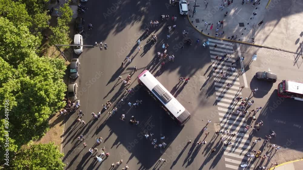 Crowd of Argentinian supporters after football world cup match along streets of Buenos Aires. Aerial top-down view
