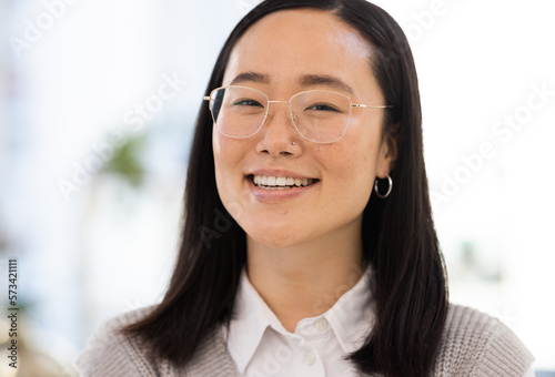 Business woman, face and portrait with success and smile, Asian worker with professional mindset and career goals. Happy employee, leadership and corporate lawyer at law firm in Japan with growth