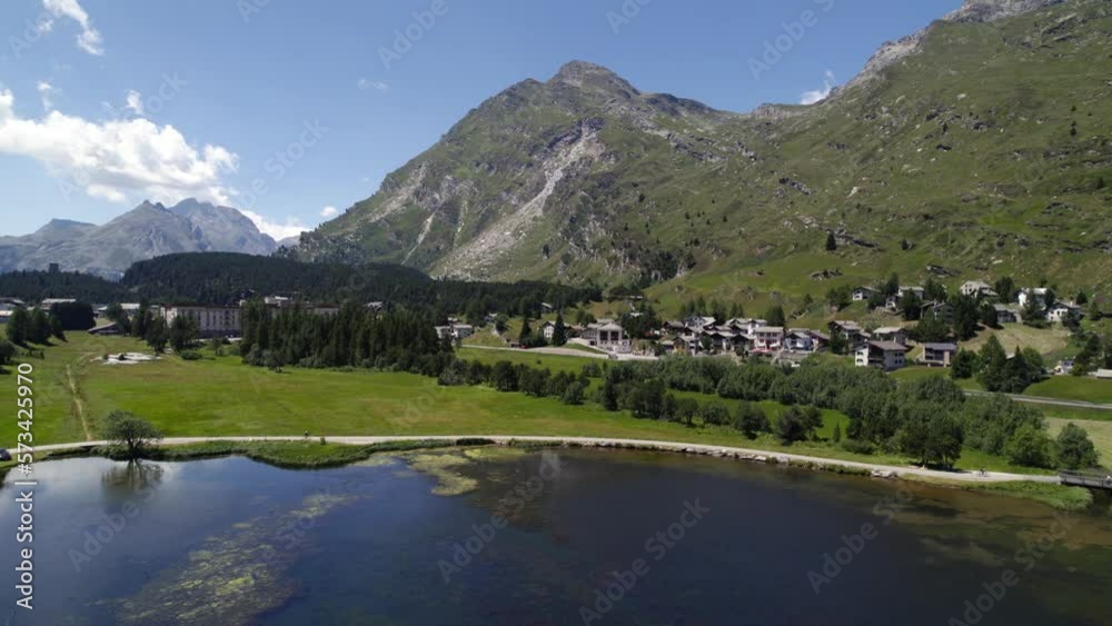 Aerial Orbit Motion Over Lake Silvaplana Lake With Scenic Mountain Views In Background Aerial Orbit Motion Over Lake Silvaplana Lake With Scenic Mountain Views In Background