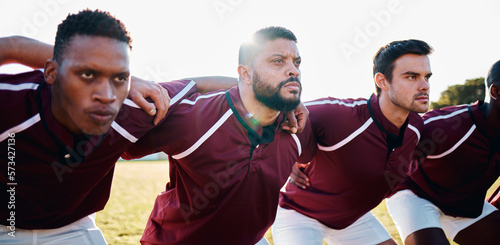 Man, huddle and team in scrum for sports collaboration coordination or focus in the outdoors. Group of sport men in fitness training, planning or getting ready for serious game, match or start
