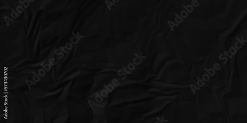 Dark Black facbric paper backdrop crumpled texture. dark black textured crumpled black paper background. panorama black paper texture background, crumpled pattern.