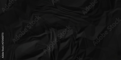 Dark Black facbric paper backdrop crumpled texture. dark black textured crumpled black paper background. panorama black paper texture background, crumpled pattern.