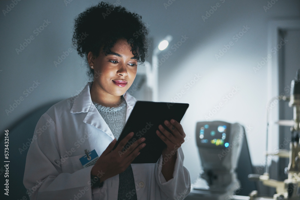 Medical doctor, tablet and black woman in hospital for online consultation, research or telehealth at night. Healthcare, technology and female physician with touchscreen for wellness app in clinic. Medical doctor, tablet and black woman in hospital for online consultation, research or telehealth at night. Healthcare, technology and female physician with touchscreen for wellness app in clinic.