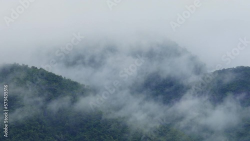 Mist flowing through the mountain valley at Khao Yai National Park, Thailand