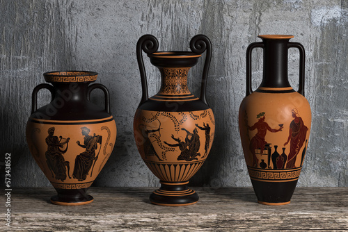 Three ancient Greek wine vases of different shapes with meander ornaments and various patterns stand in a row on a wooden shelf against a concrete wall. 3d render.