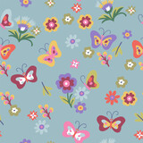 A pattern of small red, pink, purple and green butterflies and flowers on a dark turquoise background. Cute aesthetic composition for wallpaper, print, poster, postcard.