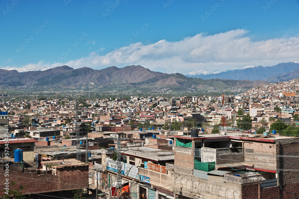 The panoramic view of Mingora in Swat valley of Himalayas, Pakistan - obrazy, fototapety, plakaty 