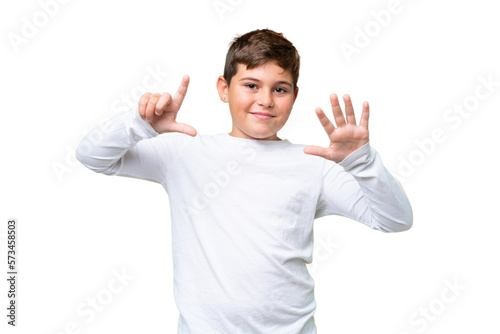 Little caucasian kid over isolated chroma key background counting seven with fingers
