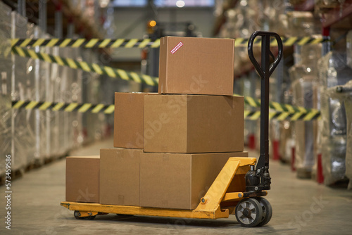 Background image of boxes stacked in commercial storage warehouse, copy space © Seventyfour