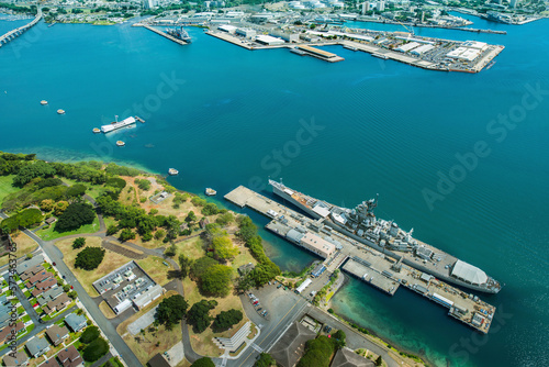 Aerial view of Arizona Memorial and Mighty Mo Missouri battleship at Pearl Harbor, Honolulu, Hawaii, USA photo