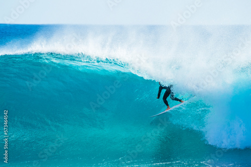 Surfer riding wave, Fuerteventura, Canary Islands, Spain