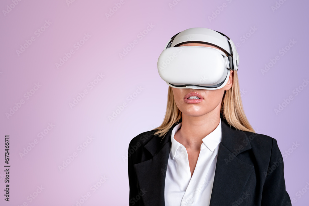 Businesswoman wearing vr headset is watching at metaverse realit Businesswoman wearing vr headset is watching at metaverse realit