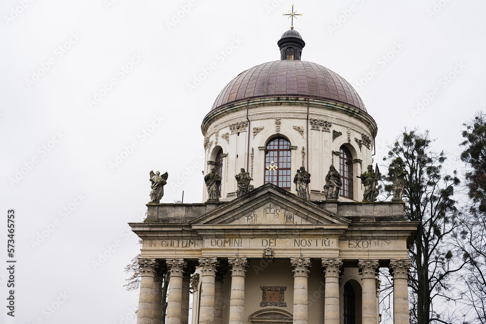 Baroque Roman Catholic church of St. Joseph mid 18th century. Latin on main facade - TO THE GLORY OF OUR LORD GOD, Pidhirtsi, Lviv Oblast, Ukraine.