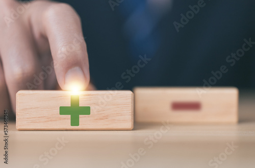 Canvas Print wooden block Show plus and minus symbols