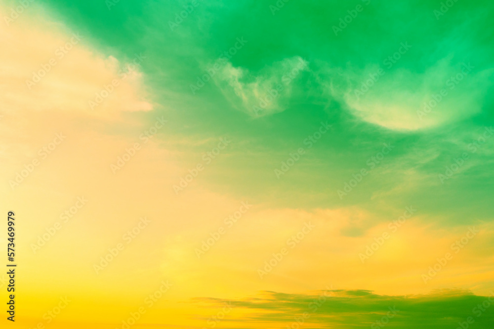 Beautiful green yellow cloudy sky at sunset. Sky texture, abstract nature background